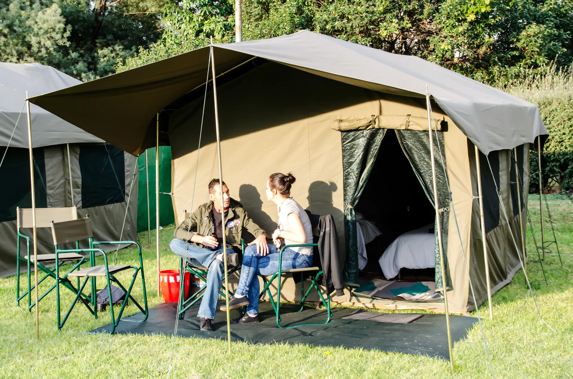 Guests enjoying their private Lux tent veranda